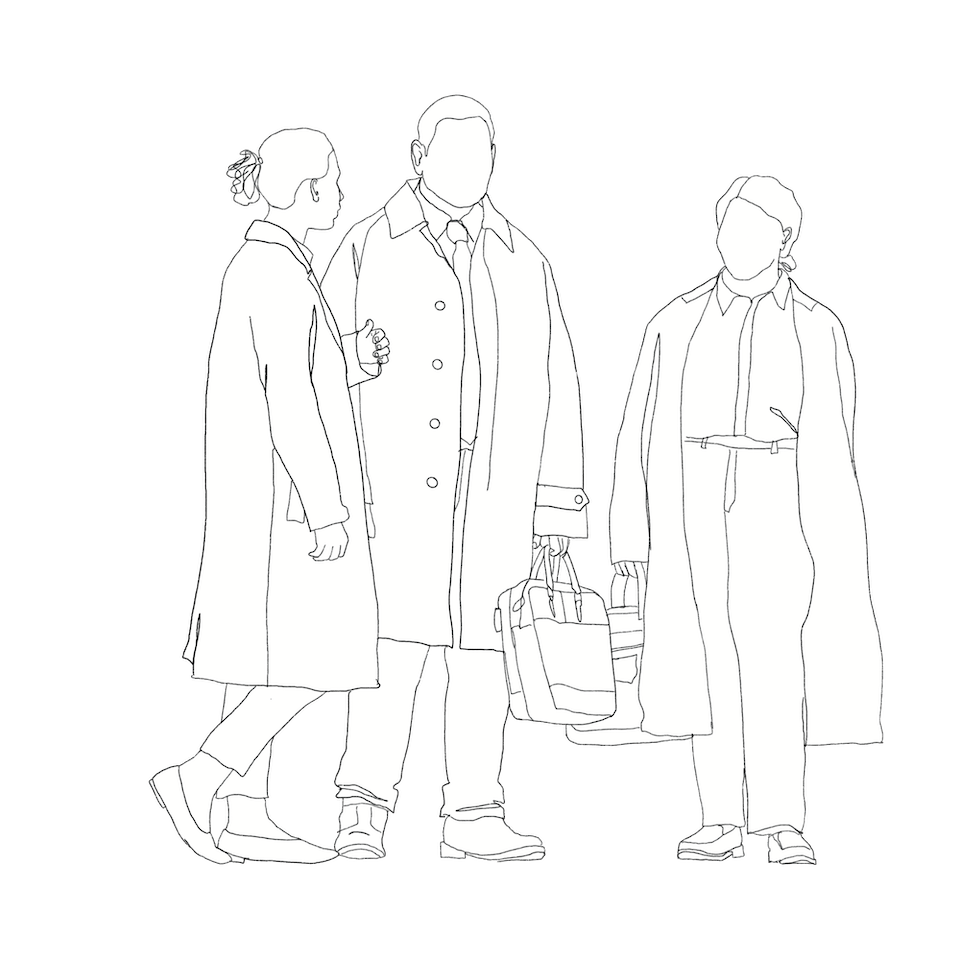 three people standing together wearing business clothing